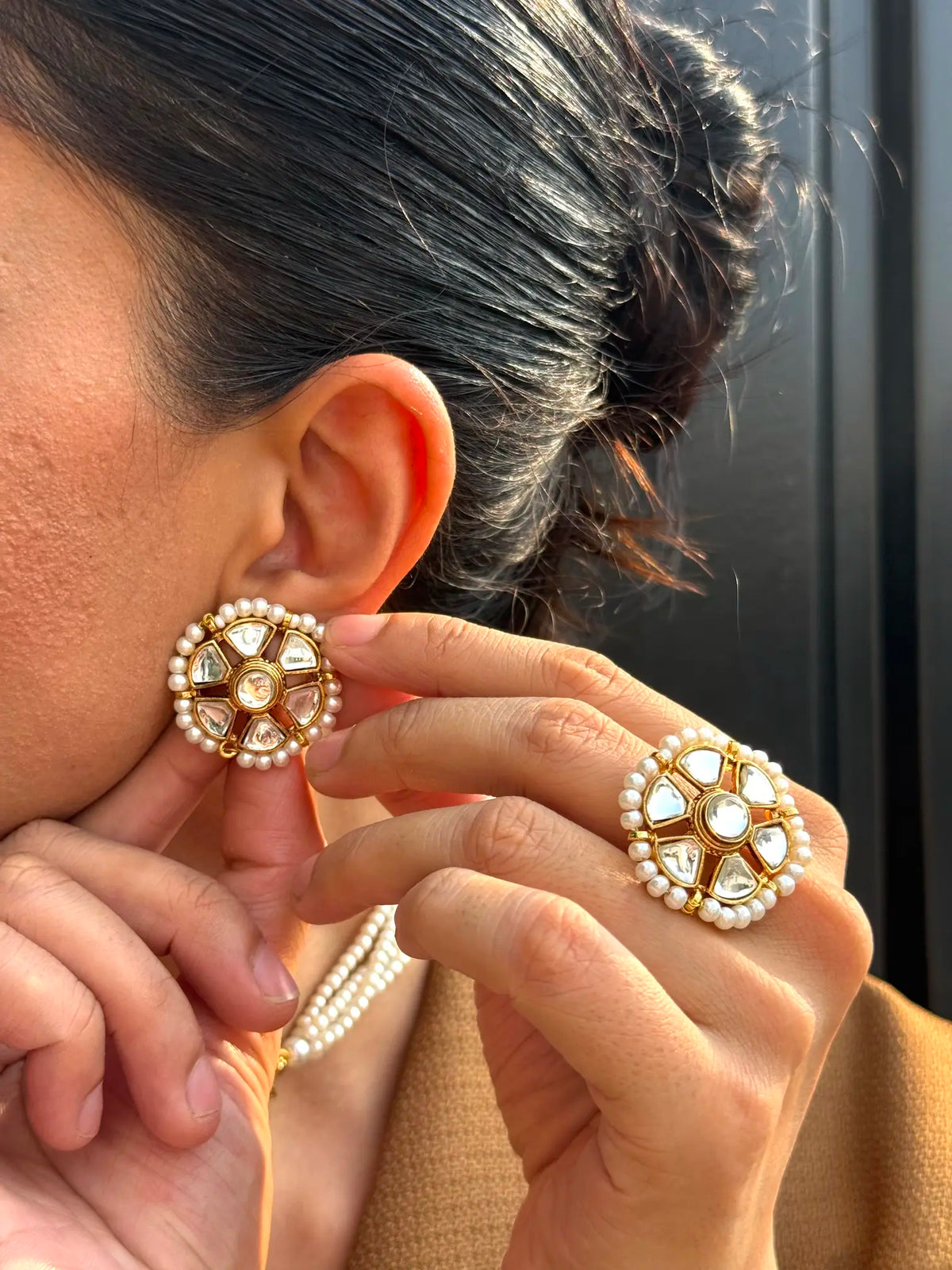 Noore Kundan stud earrings close-up