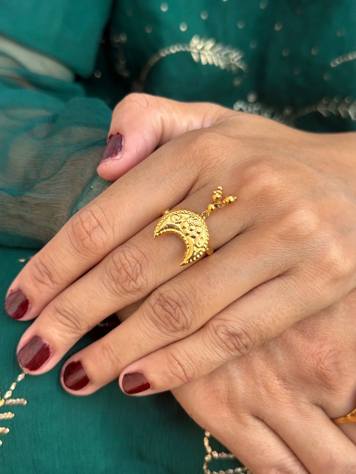 Model wearing Chand Phool traditional ring styled for festive Pakistani fashion