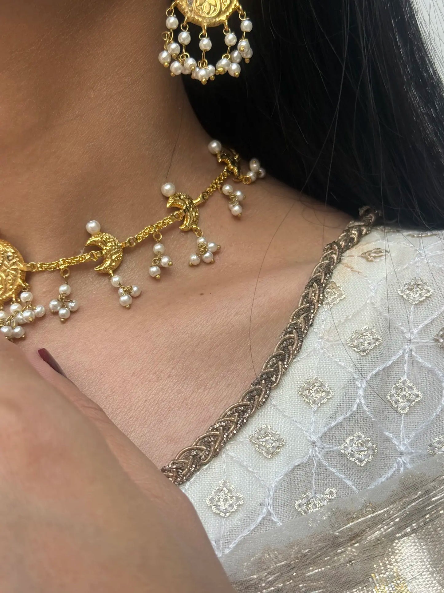 layered pearl accents and traditional bridal statement design for weddings and festive wear”