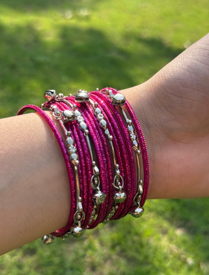 Close-up of Hania Gold Bangles with ghungro bangles highlighting texture and premium quality.

