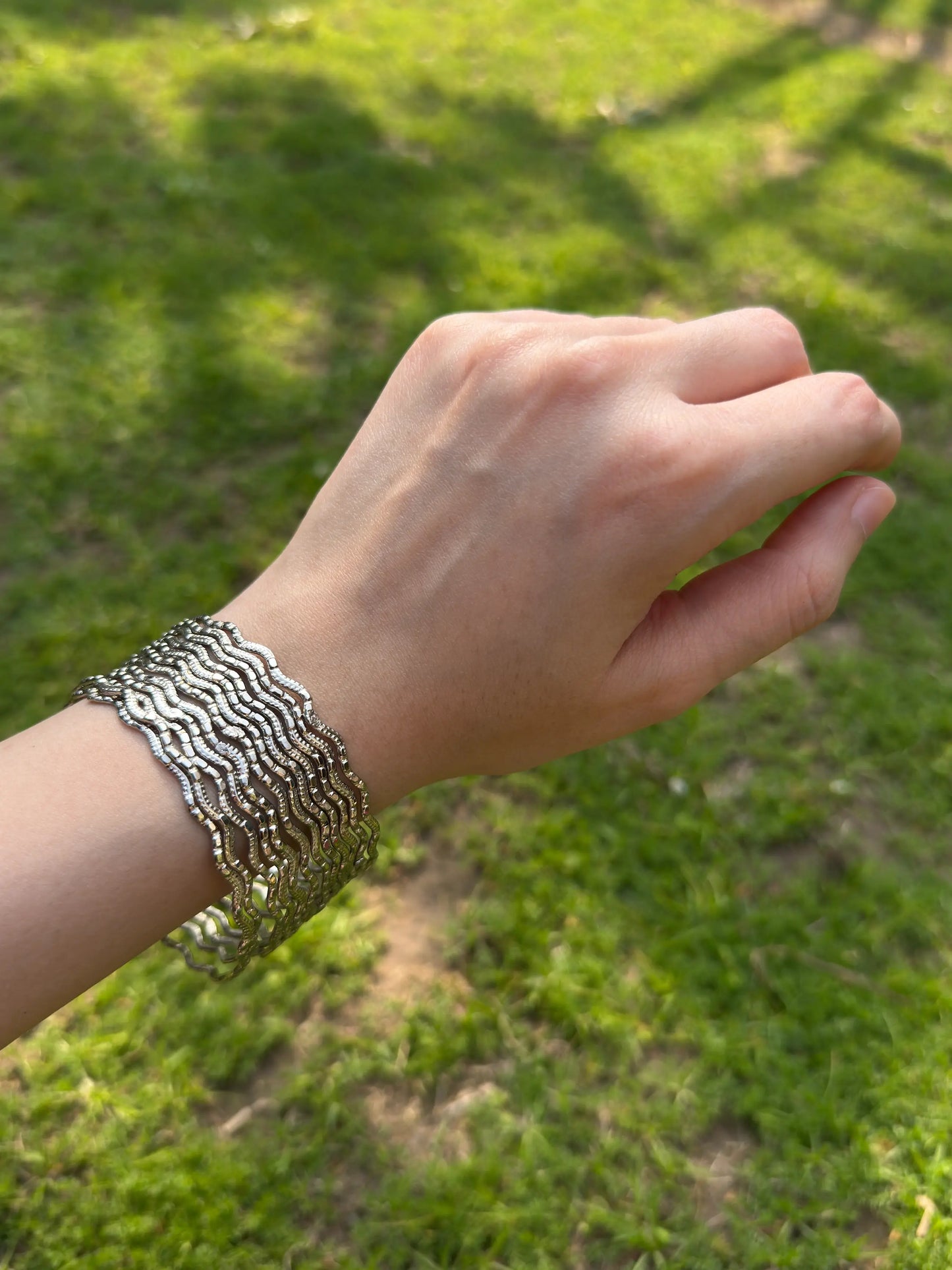 Stacked silver chamkeeli bangles set styled for traditional and festive wear