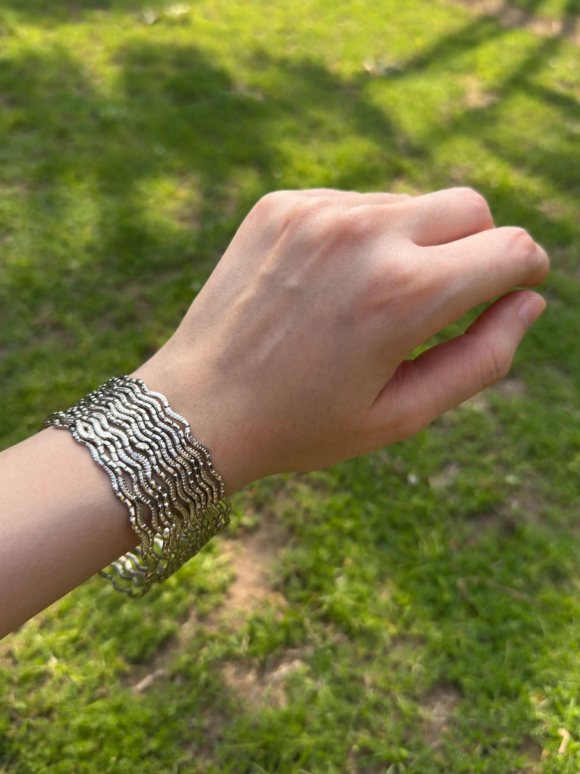 Stacked silver chamkeeli bangles set styled for traditional and festive wear