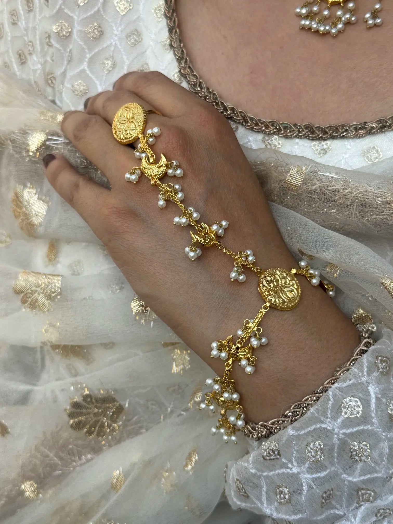 Side view of Mahi Chand Angla hand jewelry with Pakistani bridal craftsmanship