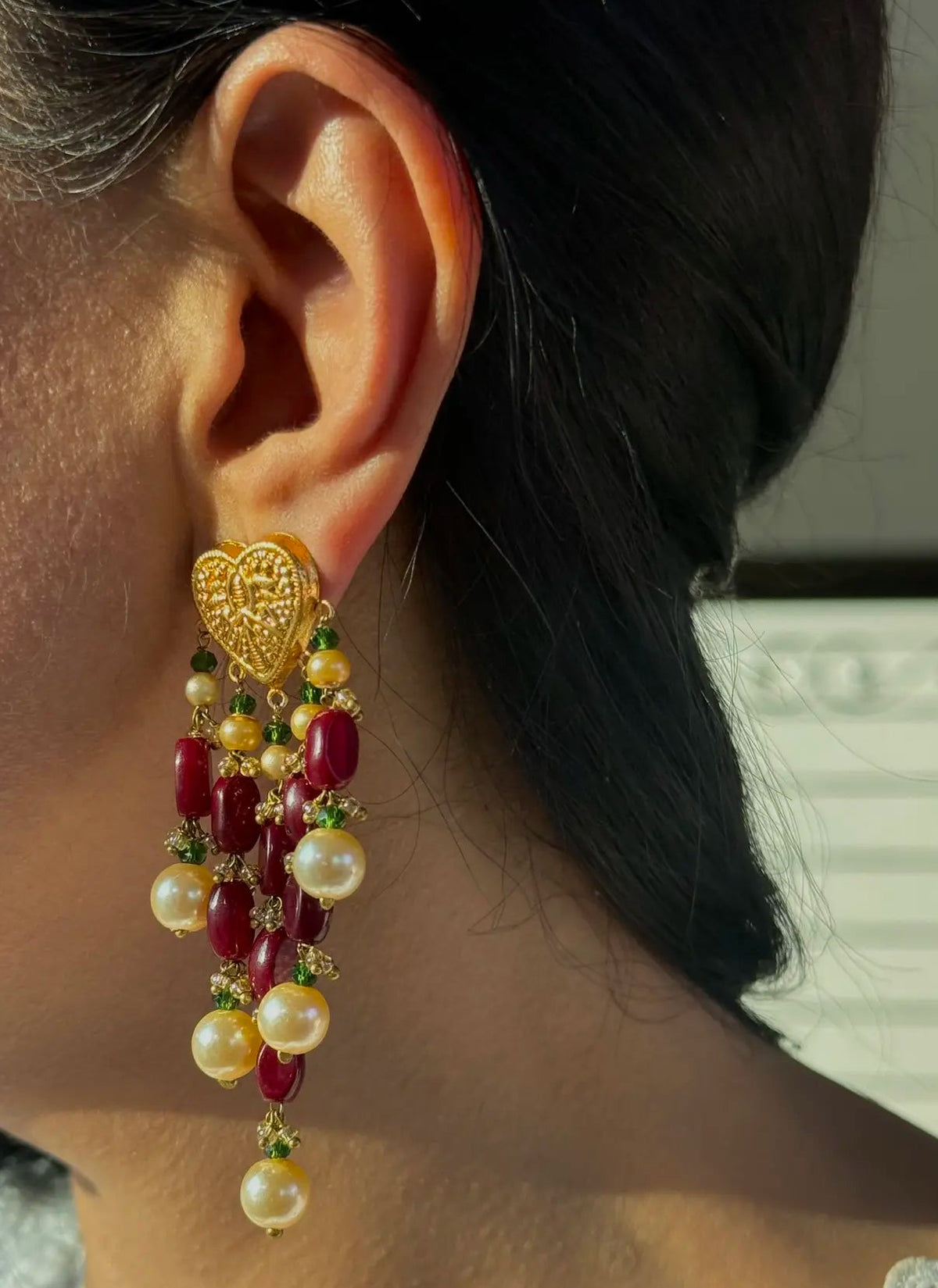 Paan traditional pearl earrings close-up