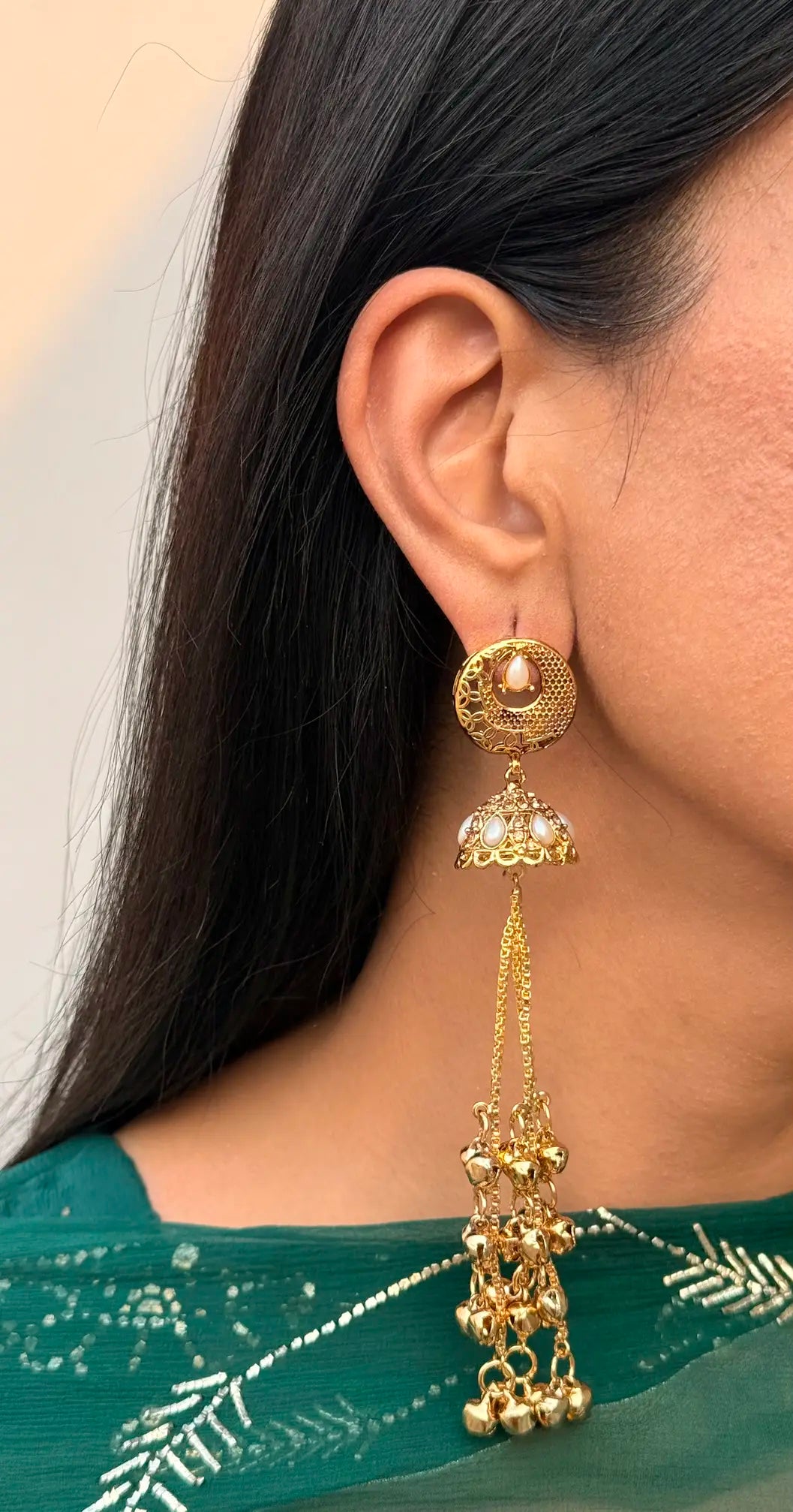 Pearl Kashmiri earrings featuring detailed jhumka artistry and traditional design