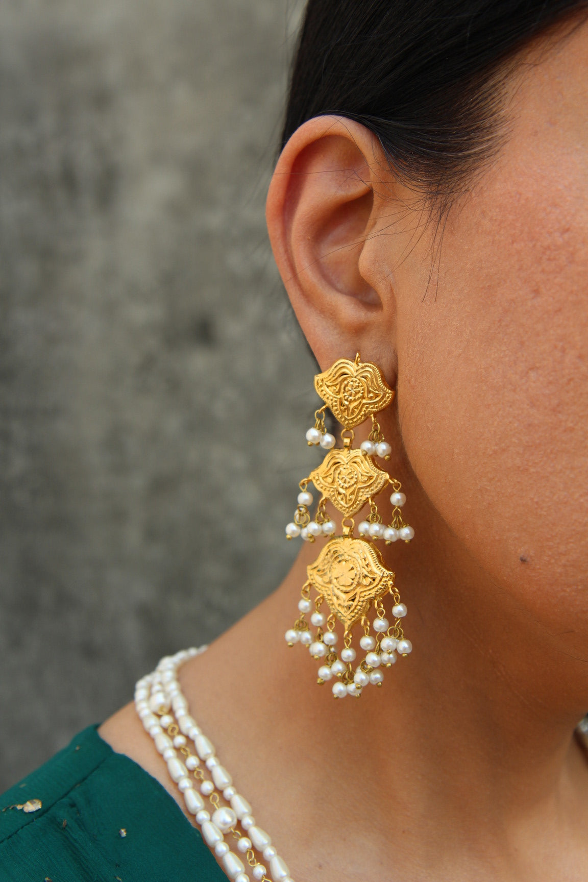 Close-up of Shaheena earrings showcasing intricate traditional craftsmanship