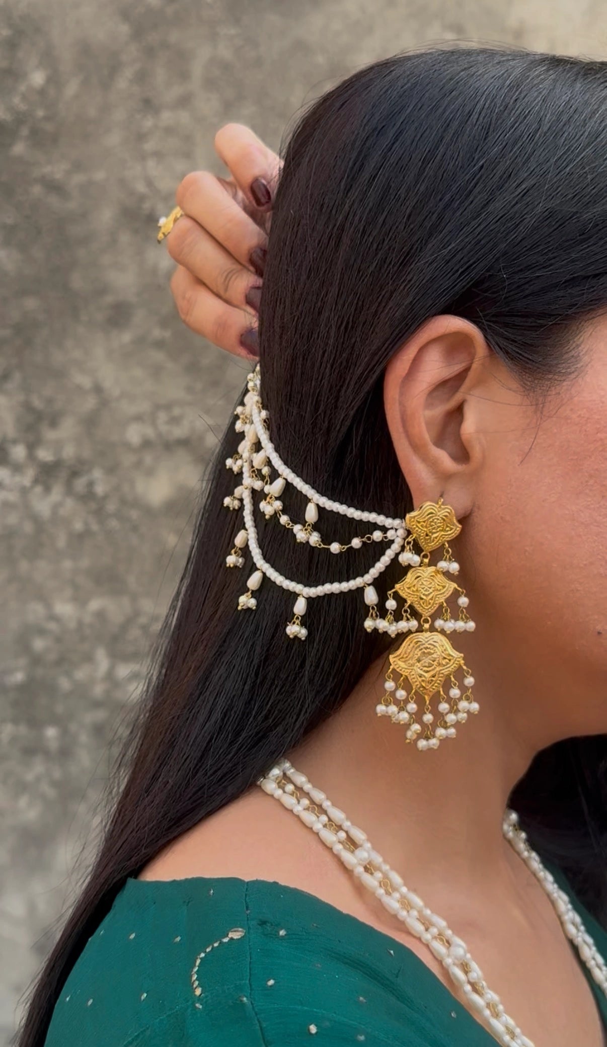 Close-up of Shaheena saharay earrings showcasing intricate detailing and craftsmanship