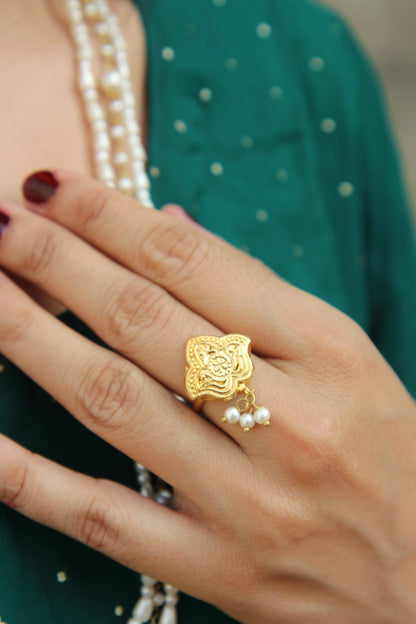 Side view of Shaheena bridal pearl ring with elegant gold and pearl finish