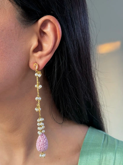Whimsical lavender traditional earring close-up