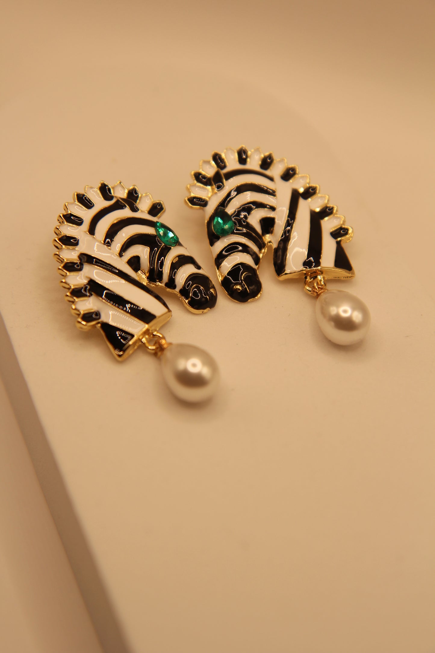 Zebra drops front view earrings with bold black and white design and pearl accents, Modern zebra pattern drop earrings with pearls for Gen Z fashion by Legacy by Bisma 