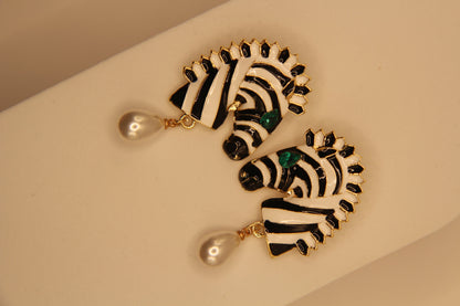Close‑up of zebra drops earrings showing pattern detail and pearl embellishment by Legacy by Bisma