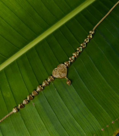 Side view of Dilbar gold plated choker showing detailed craftsmanship