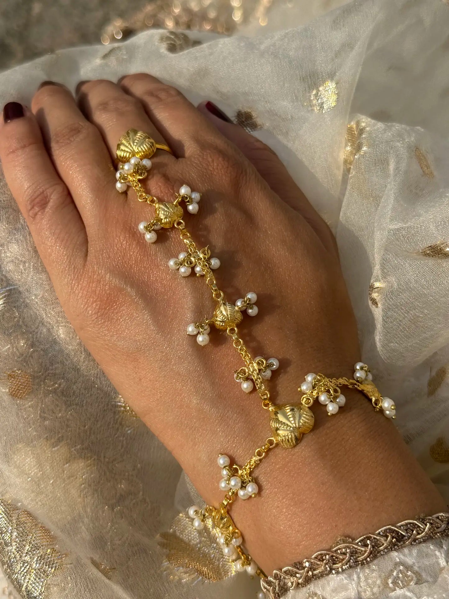 chain design and elegant bridal haath phool jewelry