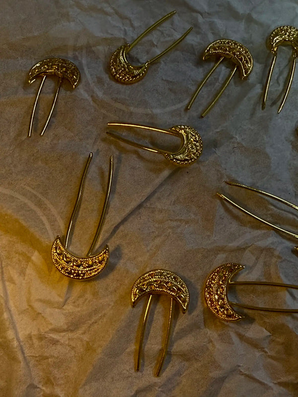 Chand bridal hair pins with traditional Pakistani gold-tone design
