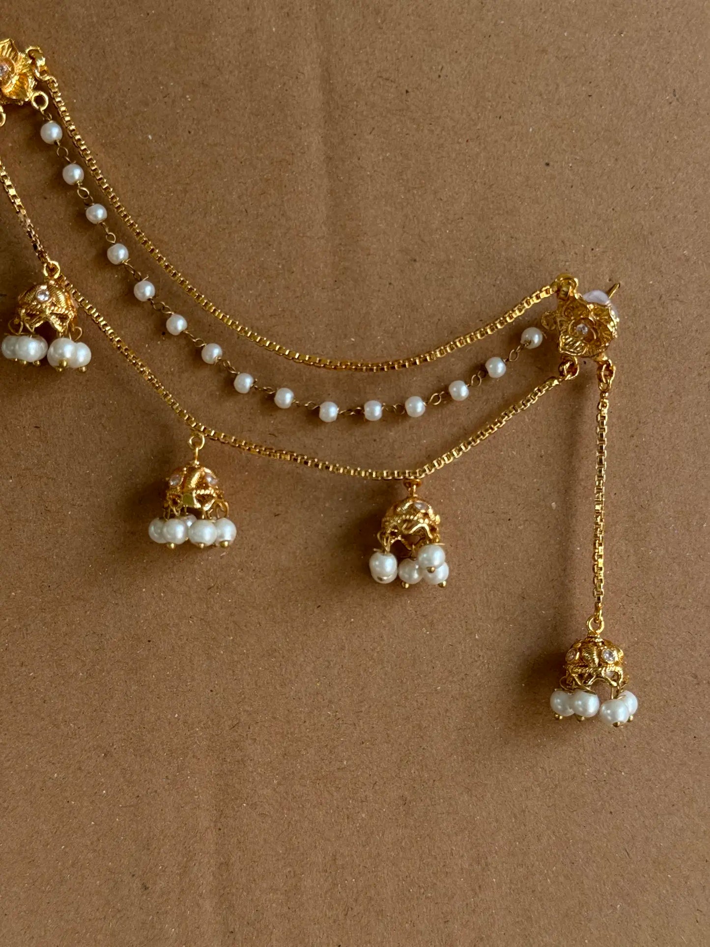 Close-up of Sahiba gold plated pearl saharay featuring intricate pearl detailing