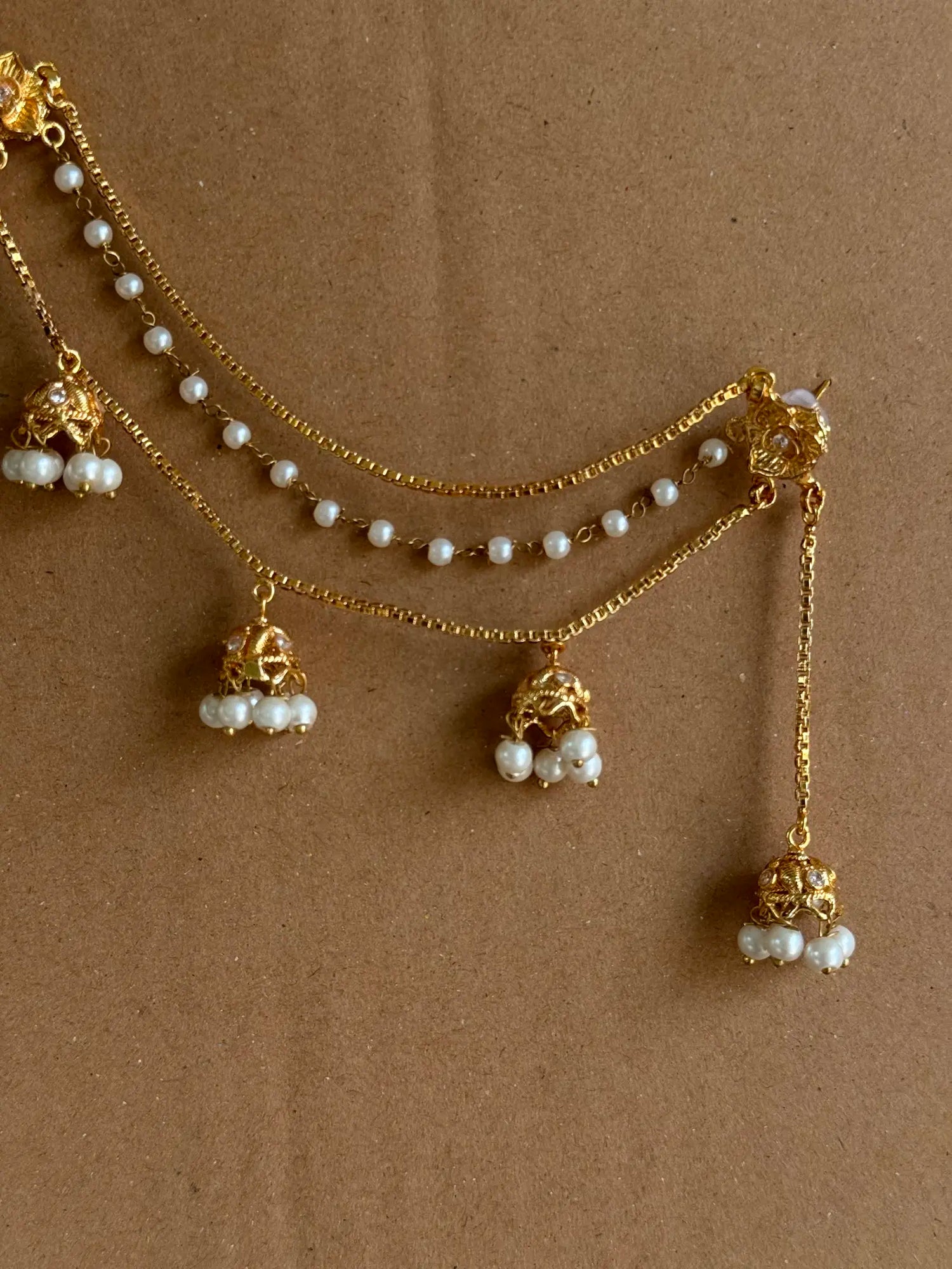 Close-up of Sahiba gold plated pearl saharay featuring intricate pearl detailing
