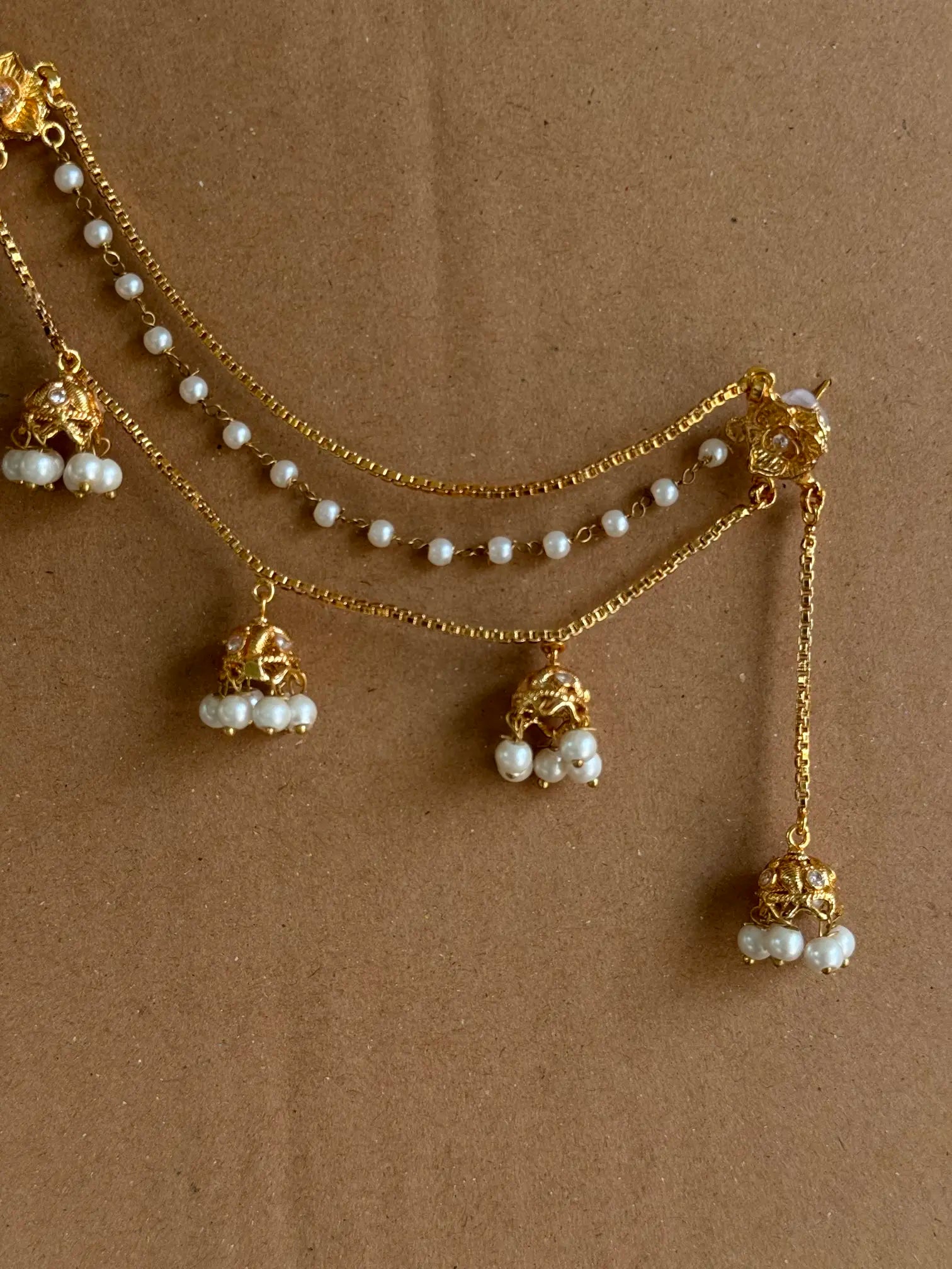 Close-up of Sahiba gold plated pearl saharay featuring intricate pearl detailing