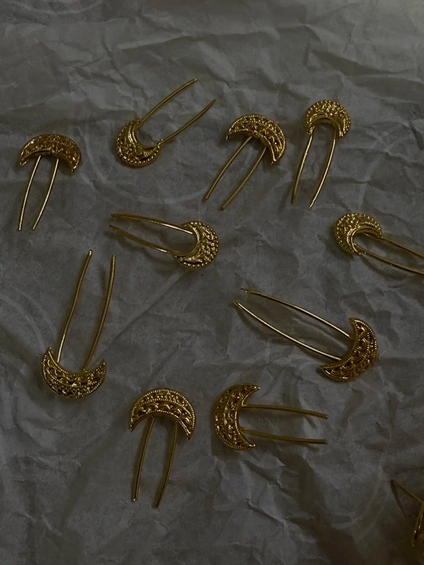 Close-up of Chand hairpins showcasing intricate traditional Pakistani craftsmanship